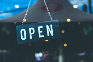 open sign on glass door